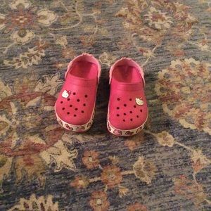 Pink hello kitty crocs